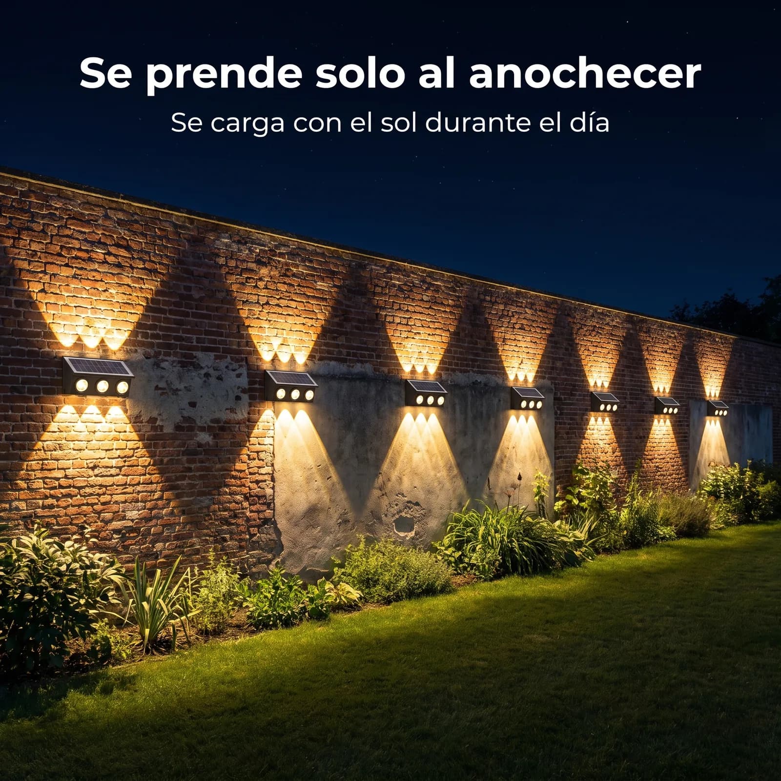 Apliques solares encendidos a lo largo de un muro de ladrillo al anochecer